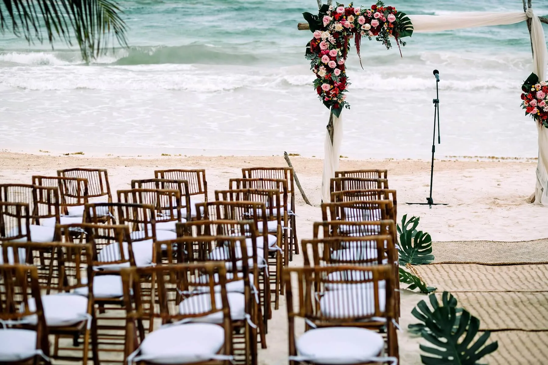 Wedding ceremony setup on the beach at The Beach Tulum